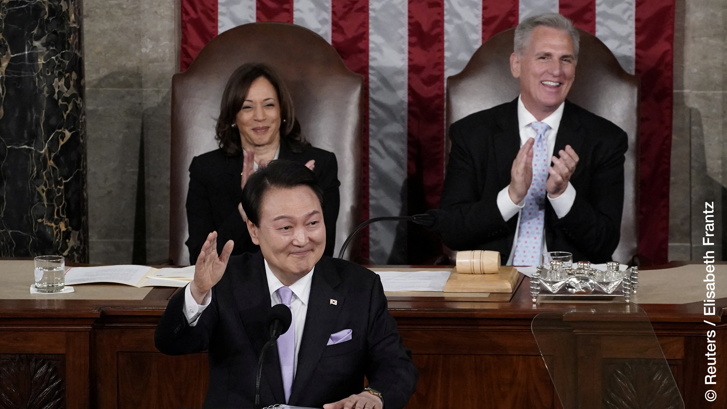 South Korea’s President Yoon Suk Yeol addresses a joint meeting of Congress as Vice President Kamala Harris and Speaker of the House Kevin McCarthy applaud in the House Chamber at the U.S. Capitol in Washington, U.S. April 27, 2023. 